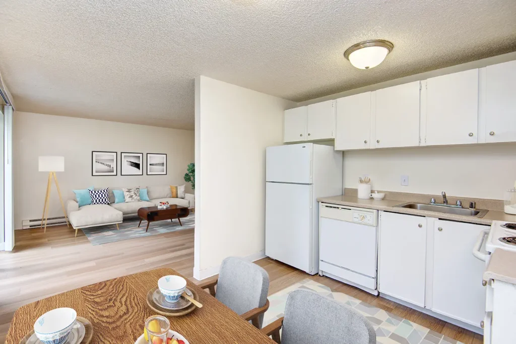 All white kitchen with adjacent dining nook