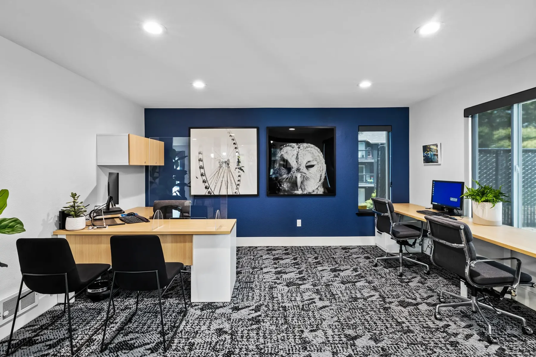 Leasing office reception desk and computer stations